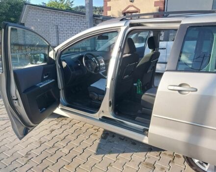 Серый Мазда 5, объемом двигателя 2 л и пробегом 310 тыс. км за 4900 $, фото 1 на Automoto.ua
