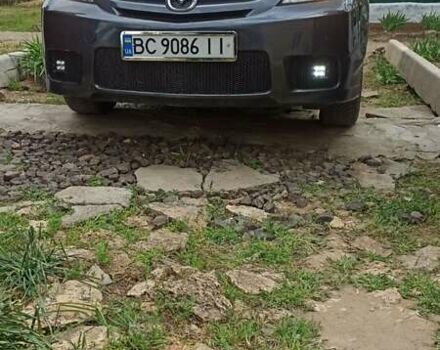 Серый Мазда 5, объемом двигателя 2 л и пробегом 137 тыс. км за 5300 $, фото 1 на Automoto.ua