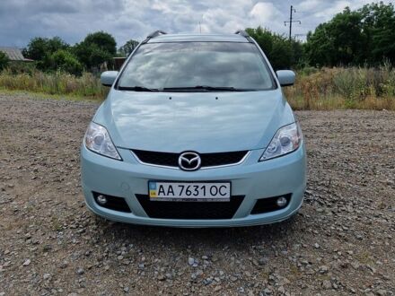 Серый Мазда 5, объемом двигателя 2 л и пробегом 213 тыс. км за 5250 $, фото 1 на Automoto.ua