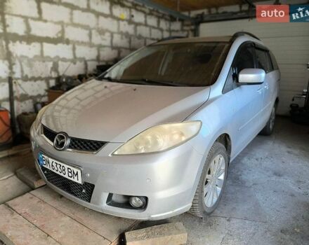Серый Мазда 5, объемом двигателя 2 л и пробегом 163 тыс. км за 6000 $, фото 1 на Automoto.ua
