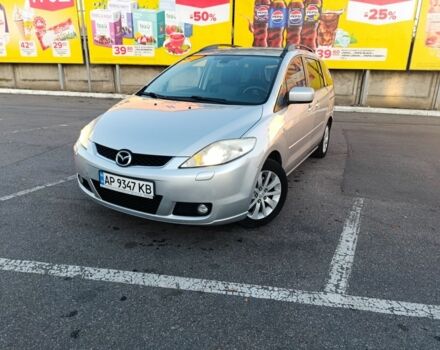 Серый Мазда 5, объемом двигателя 2 л и пробегом 319 тыс. км за 4000 $, фото 1 на Automoto.ua