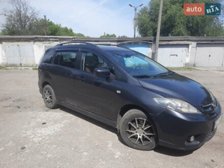 Серый Мазда 5, объемом двигателя 2 л и пробегом 240 тыс. км за 4795 $, фото 1 на Automoto.ua