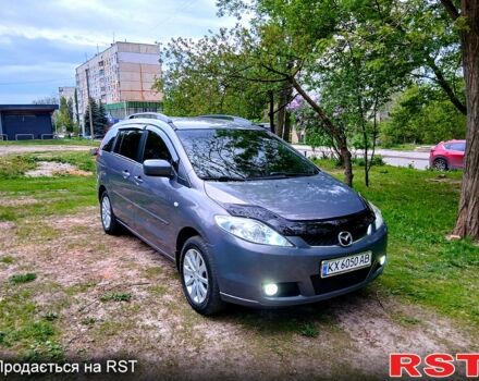 Серый Мазда 5, объемом двигателя 2 л и пробегом 318 тыс. км за 5500 $, фото 1 на Automoto.ua