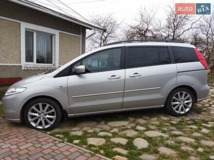 Серый Мазда 5, объемом двигателя 2 л и пробегом 222 тыс. км за 6300 $, фото 1 на Automoto.ua