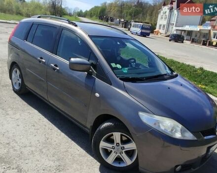 Серый Мазда 5, объемом двигателя 2 л и пробегом 210 тыс. км за 5000 $, фото 1 на Automoto.ua