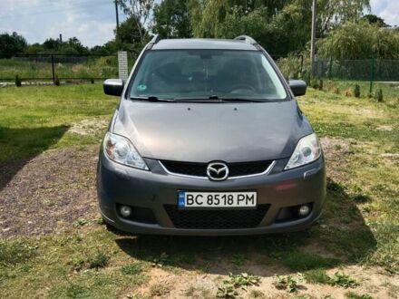 Серый Мазда 5, объемом двигателя 2 л и пробегом 234 тыс. км за 5200 $, фото 1 на Automoto.ua