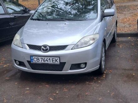 Серый Мазда 5, объемом двигателя 2 л и пробегом 284 тыс. км за 4800 $, фото 1 на Automoto.ua