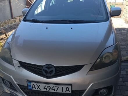 Серый Мазда 5, объемом двигателя 2 л и пробегом 299 тыс. км за 4500 $, фото 1 на Automoto.ua