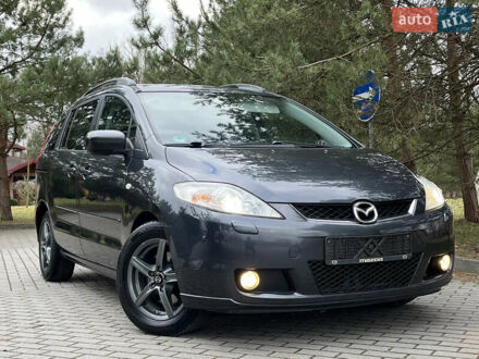 Серый Мазда 5, объемом двигателя 2 л и пробегом 256 тыс. км за 5700 $, фото 1 на Automoto.ua