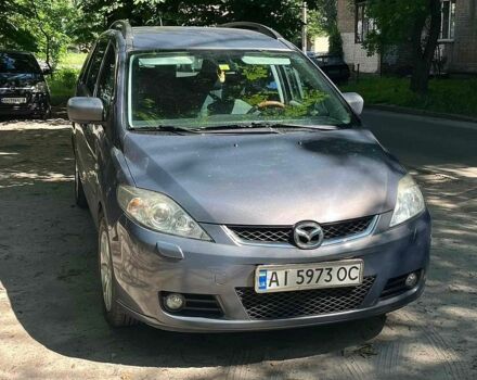 Серый Мазда 5, объемом двигателя 2 л и пробегом 330 тыс. км за 3850 $, фото 1 на Automoto.ua