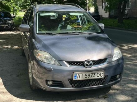Серый Мазда 5, объемом двигателя 2 л и пробегом 15 тыс. км за 4216 $, фото 1 на Automoto.ua