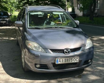 Серый Мазда 5, объемом двигателя 2 л и пробегом 15 тыс. км за 4025 $, фото 1 на Automoto.ua