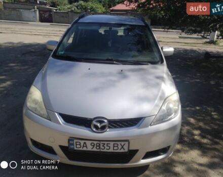 Серый Мазда 5, объемом двигателя 2 л и пробегом 169 тыс. км за 5300 $, фото 1 на Automoto.ua