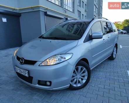 Серый Мазда 5, объемом двигателя 2 л и пробегом 255 тыс. км за 5200 $, фото 1 на Automoto.ua