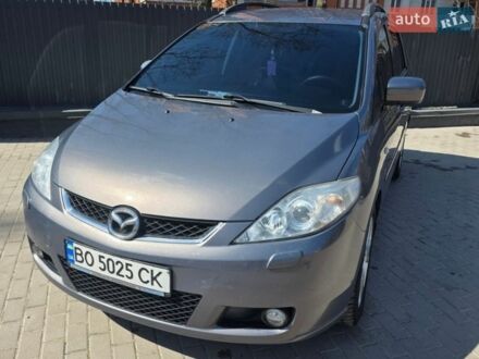 Серый Мазда 5, объемом двигателя 2 л и пробегом 301 тыс. км за 5400 $, фото 1 на Automoto.ua
