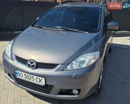 Серый Мазда 5, объемом двигателя 2 л и пробегом 301 тыс. км за 5400 $, фото 1 на Automoto.ua
