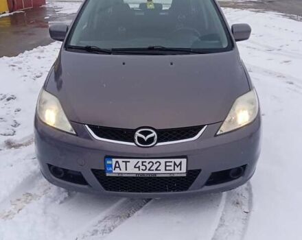 Серый Мазда 5, объемом двигателя 2 л и пробегом 258 тыс. км за 4800 $, фото 1 на Automoto.ua