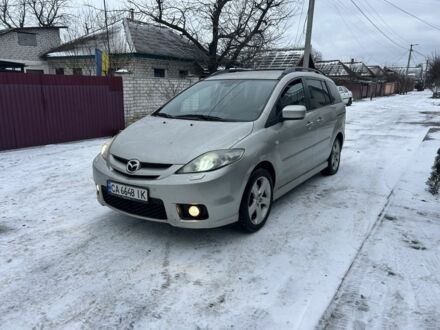 Серый Мазда 5, объемом двигателя 2 л и пробегом 231 тыс. км за 5350 $, фото 1 на Automoto.ua