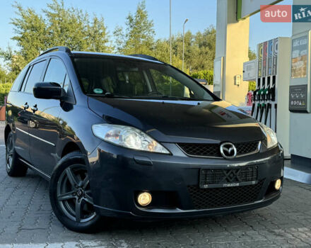 Серый Мазда 5, объемом двигателя 2 л и пробегом 256 тыс. км за 5599 $, фото 1 на Automoto.ua