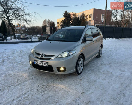 Серый Мазда 5, объемом двигателя 2 л и пробегом 233 тыс. км за 5650 $, фото 1 на Automoto.ua