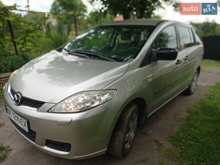 Серый Мазда 5, объемом двигателя 1.8 л и пробегом 218 тыс. км за 5500 $, фото 1 на Automoto.ua