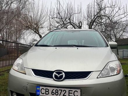 Серый Мазда 5, объемом двигателя 2 л и пробегом 414 тыс. км за 3700 $, фото 1 на Automoto.ua