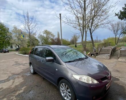 Серый Мазда 5, объемом двигателя 2 л и пробегом 300 тыс. км за 5300 $, фото 1 на Automoto.ua