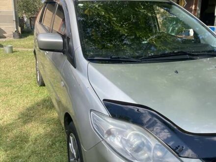 Серый Мазда 5, объемом двигателя 2 л и пробегом 248 тыс. км за 6000 $, фото 1 на Automoto.ua