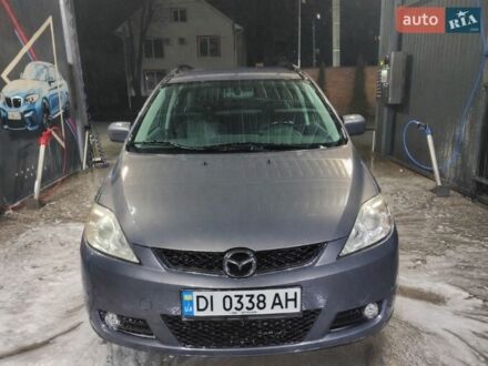 Серый Мазда 5, объемом двигателя 1.8 л и пробегом 251 тыс. км за 5400 $, фото 1 на Automoto.ua