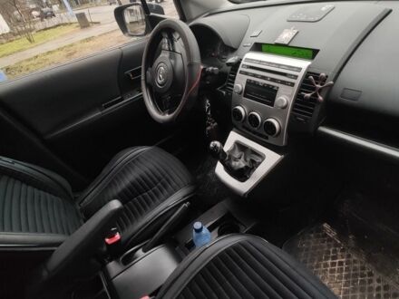 Серый Мазда 5, объемом двигателя 2 л и пробегом 249 тыс. км за 5500 $, фото 1 на Automoto.ua