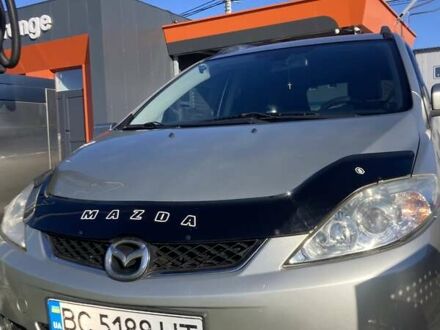 Серый Мазда 5, объемом двигателя 2 л и пробегом 255 тыс. км за 6000 $, фото 1 на Automoto.ua