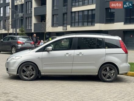Серый Мазда 5, объемом двигателя 2 л и пробегом 299 тыс. км за 5500 $, фото 1 на Automoto.ua