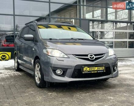 Серый Мазда 5, объемом двигателя 2 л и пробегом 264 тыс. км за 6000 $, фото 1 на Automoto.ua
