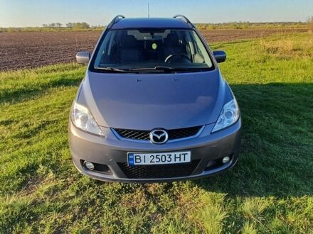 Серый Мазда 5, объемом двигателя 2 л и пробегом 195 тыс. км за 5000 $, фото 1 на Automoto.ua