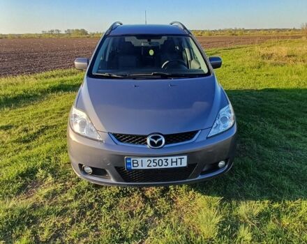 Серый Мазда 5, объемом двигателя 2 л и пробегом 195 тыс. км за 5000 $, фото 1 на Automoto.ua