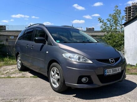 Серый Мазда 5, объемом двигателя 2 л и пробегом 335 тыс. км за 6000 $, фото 1 на Automoto.ua