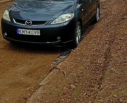 Серый Мазда 5, объемом двигателя 1.8 л и пробегом 314 тыс. км за 4000 $, фото 1 на Automoto.ua