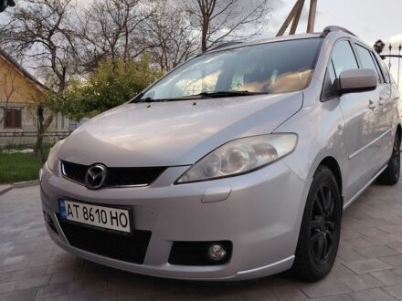Серый Мазда 5, объемом двигателя 2 л и пробегом 232 тыс. км за 6000 $, фото 1 на Automoto.ua