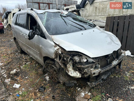 Серый Мазда 5, объемом двигателя 2 л и пробегом 200 тыс. км за 1500 $, фото 1 на Automoto.ua