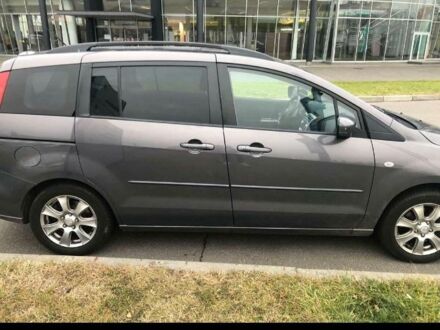 Серый Мазда 5, объемом двигателя 2 л и пробегом 313 тыс. км за 4200 $, фото 1 на Automoto.ua