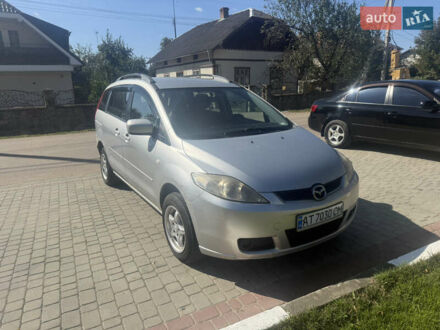 Серый Мазда 5, объемом двигателя 2 л и пробегом 401 тыс. км за 4500 $, фото 1 на Automoto.ua