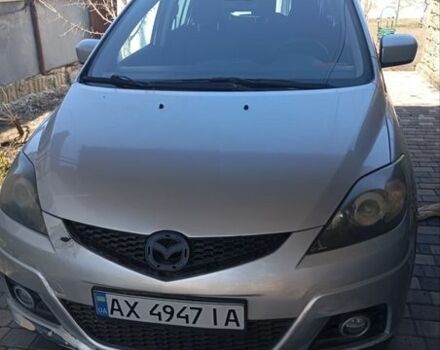 Серый Мазда 5, объемом двигателя 2 л и пробегом 299 тыс. км за 4500 $, фото 1 на Automoto.ua