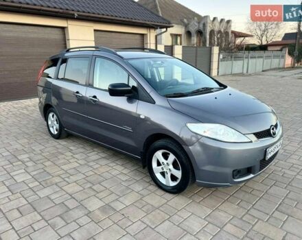 Серый Мазда 5, объемом двигателя 2 л и пробегом 249 тыс. км за 4300 $, фото 1 на Automoto.ua