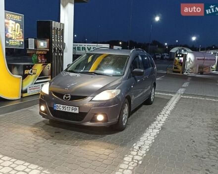 Серый Мазда 5, объемом двигателя 2 л и пробегом 330 тыс. км за 6500 $, фото 1 на Automoto.ua