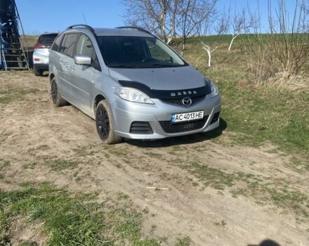Серый Мазда 5, объемом двигателя 2 л и пробегом 251 тыс. км за 4500 $, фото 1 на Automoto.ua