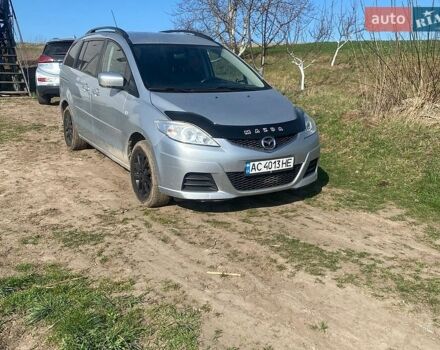 Серый Мазда 5, объемом двигателя 2 л и пробегом 258 тыс. км за 4150 $, фото 1 на Automoto.ua