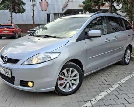 Серый Мазда 5, объемом двигателя 2 л и пробегом 227 тыс. км за 4750 $, фото 1 на Automoto.ua