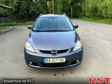 Серый Мазда 5, объемом двигателя 2 л и пробегом 210 тыс. км за 4600 $, фото 1 на Automoto.ua