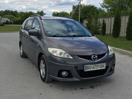 Серый Мазда 5, объемом двигателя 2 л и пробегом 266 тыс. км за 7700 $, фото 1 на Automoto.ua