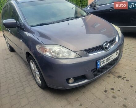 Серый Мазда 5, объемом двигателя 2 л и пробегом 342 тыс. км за 5300 $, фото 1 на Automoto.ua